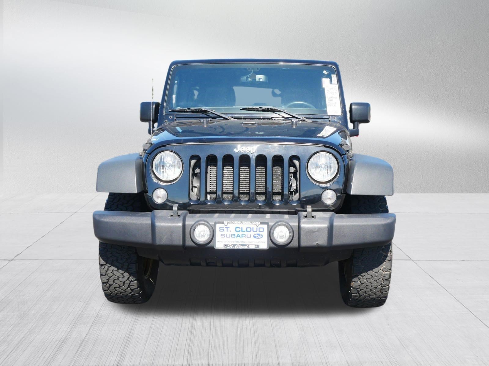 Used 2015 Jeep Wrangler Unlimited Rubicon with VIN 1C4BJWFG4FL684863 for sale in Saint Cloud, Minnesota