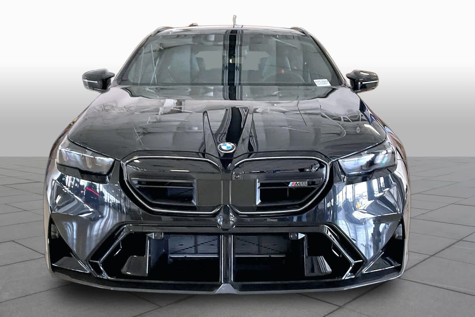 New 2027 Black Sapphire Metallic BMW  image 3