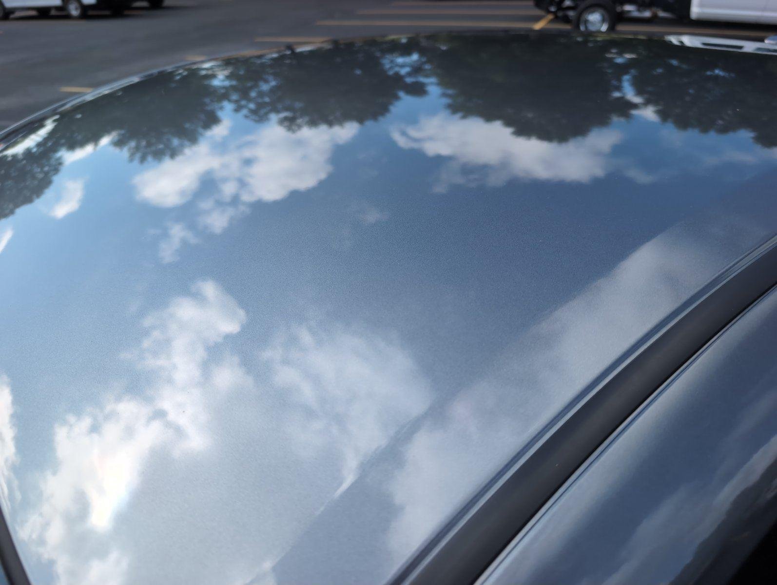 Used 2024 Gun Metallic Nissan SV image 14