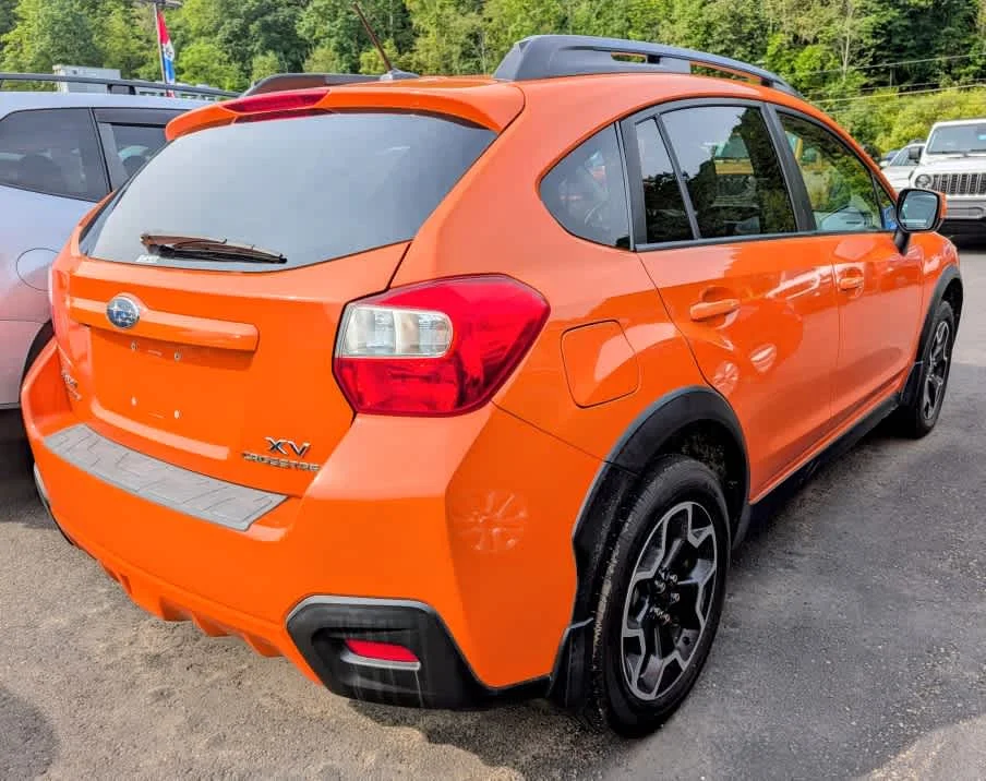 Used 2013 Tangerine Orange Pearl Subaru Limited image 6