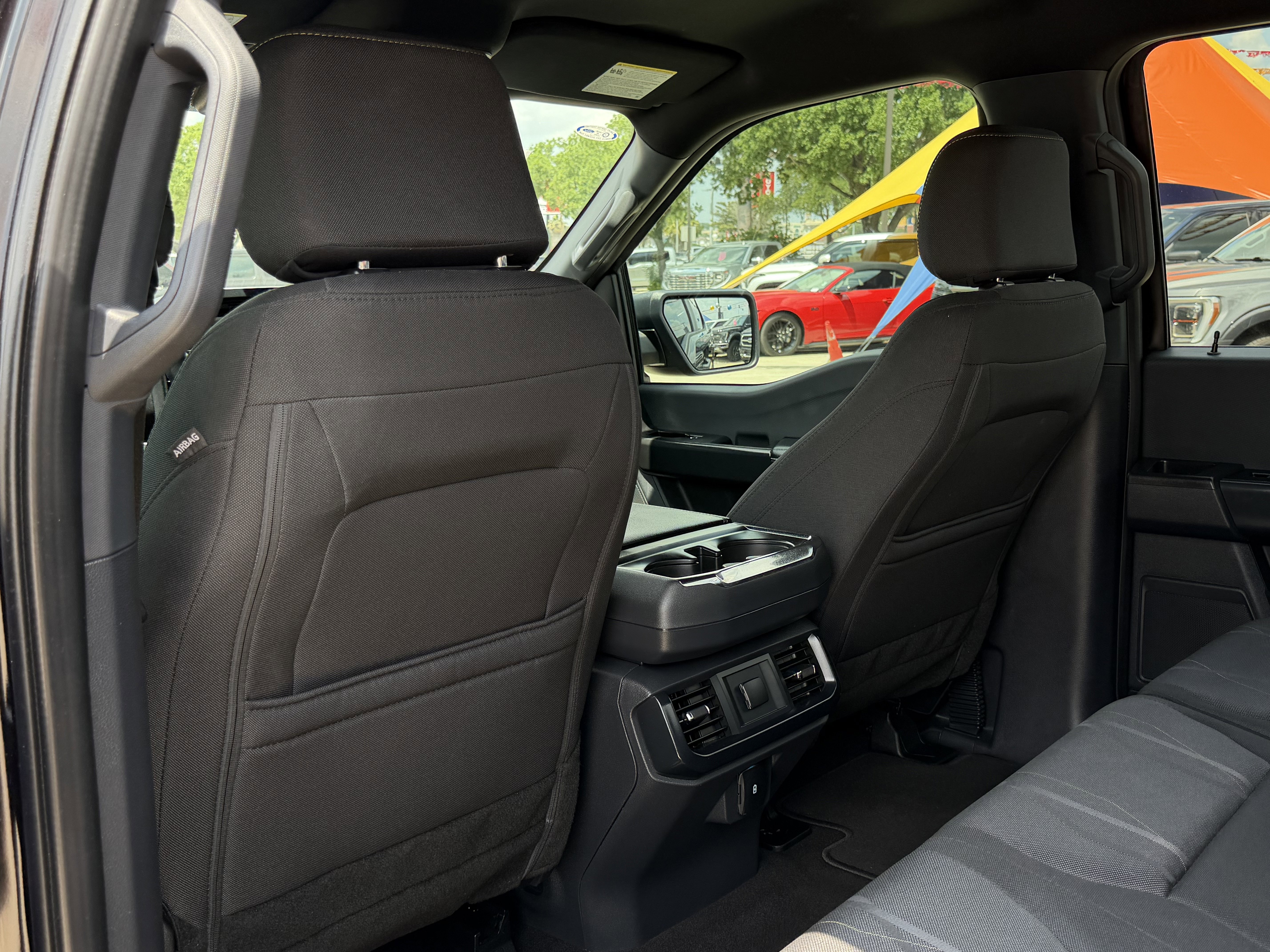 Used 2024 Agate Black Metallic Ford STX image 14