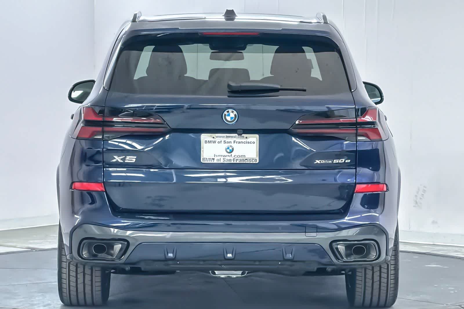 New 2026 Tanzanite Blue II Metallic BMW xDrive50e image 7