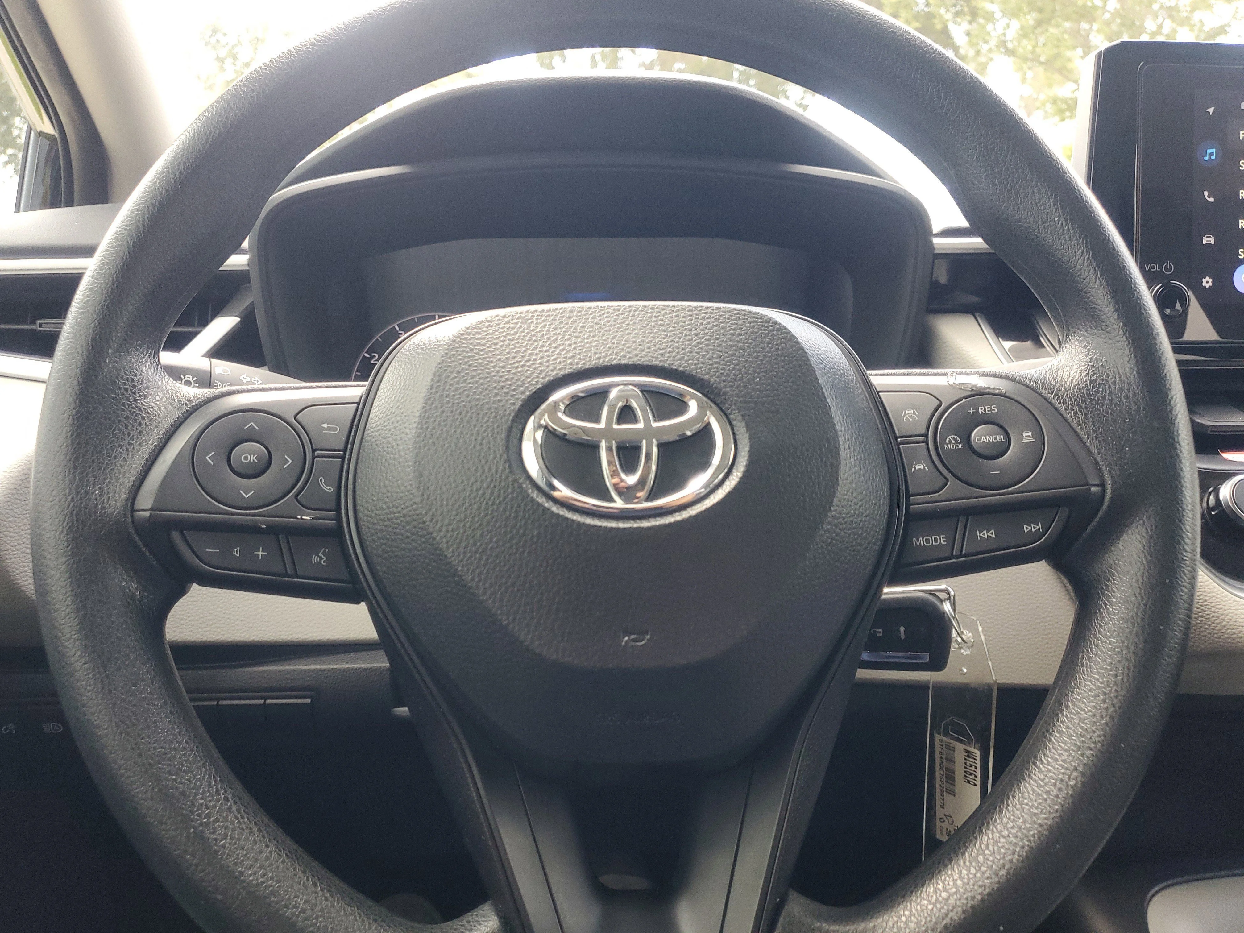 Used 2025 Midnight Black Metallic Toyota LE image 19