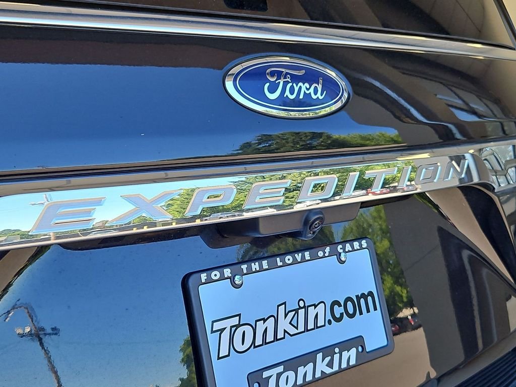 Used 2021 Agate Black Metallic Ford Limited image 26