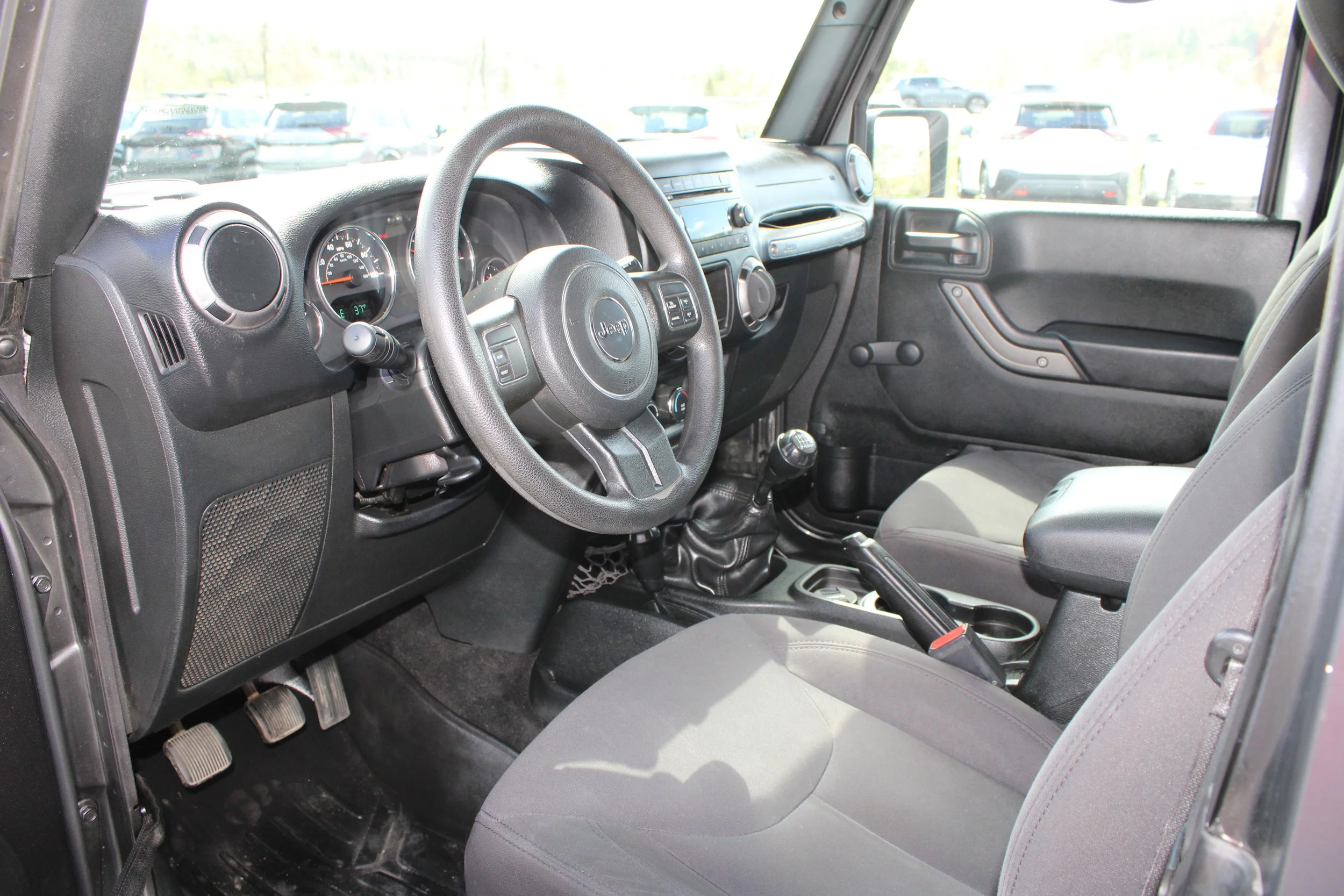 Used 2017 Granite Crystal Metallic Clearcoat Jeep Sport image 12