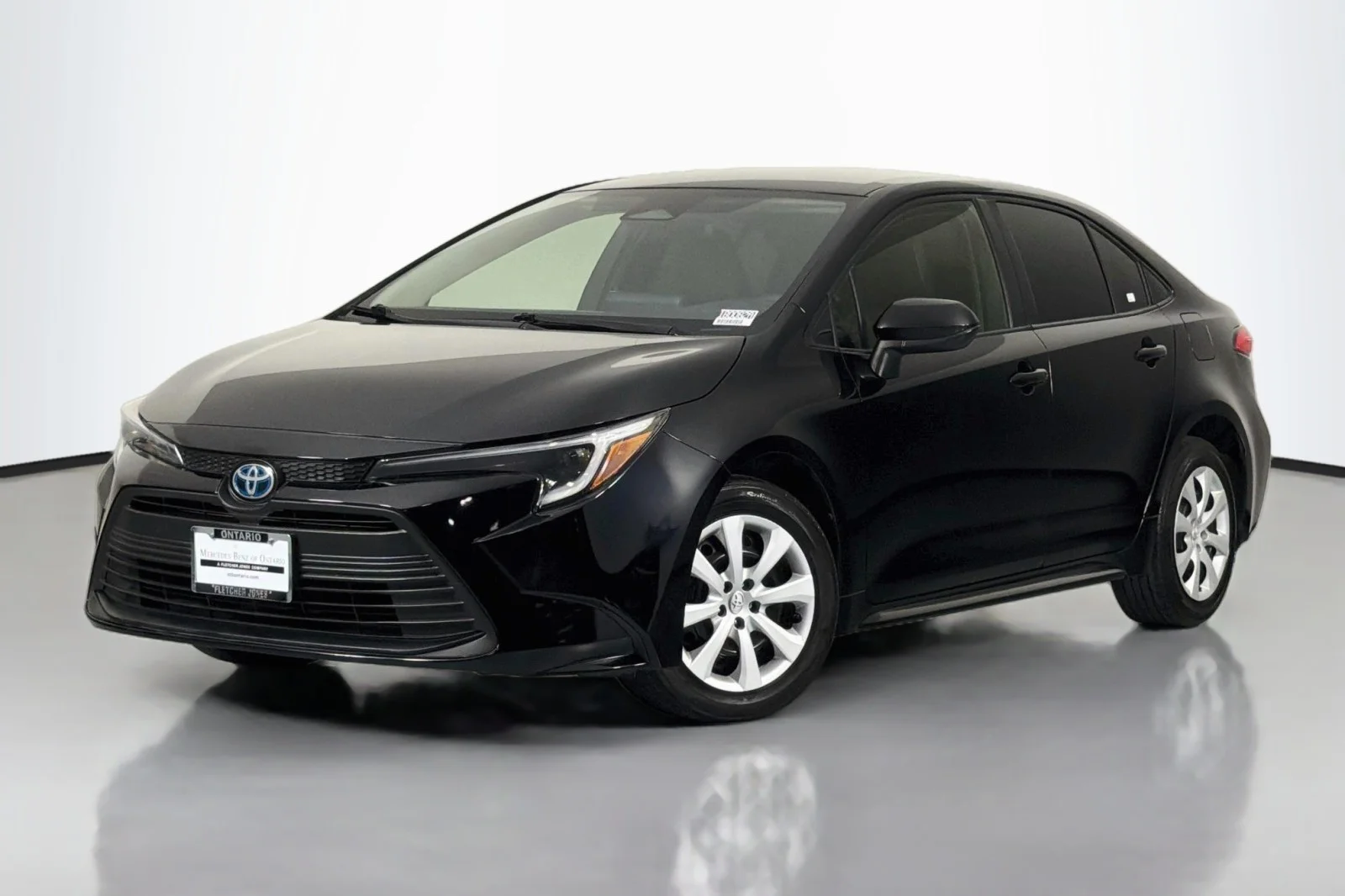 Used 2023 BLACK Toyota Hybrid LE image 1