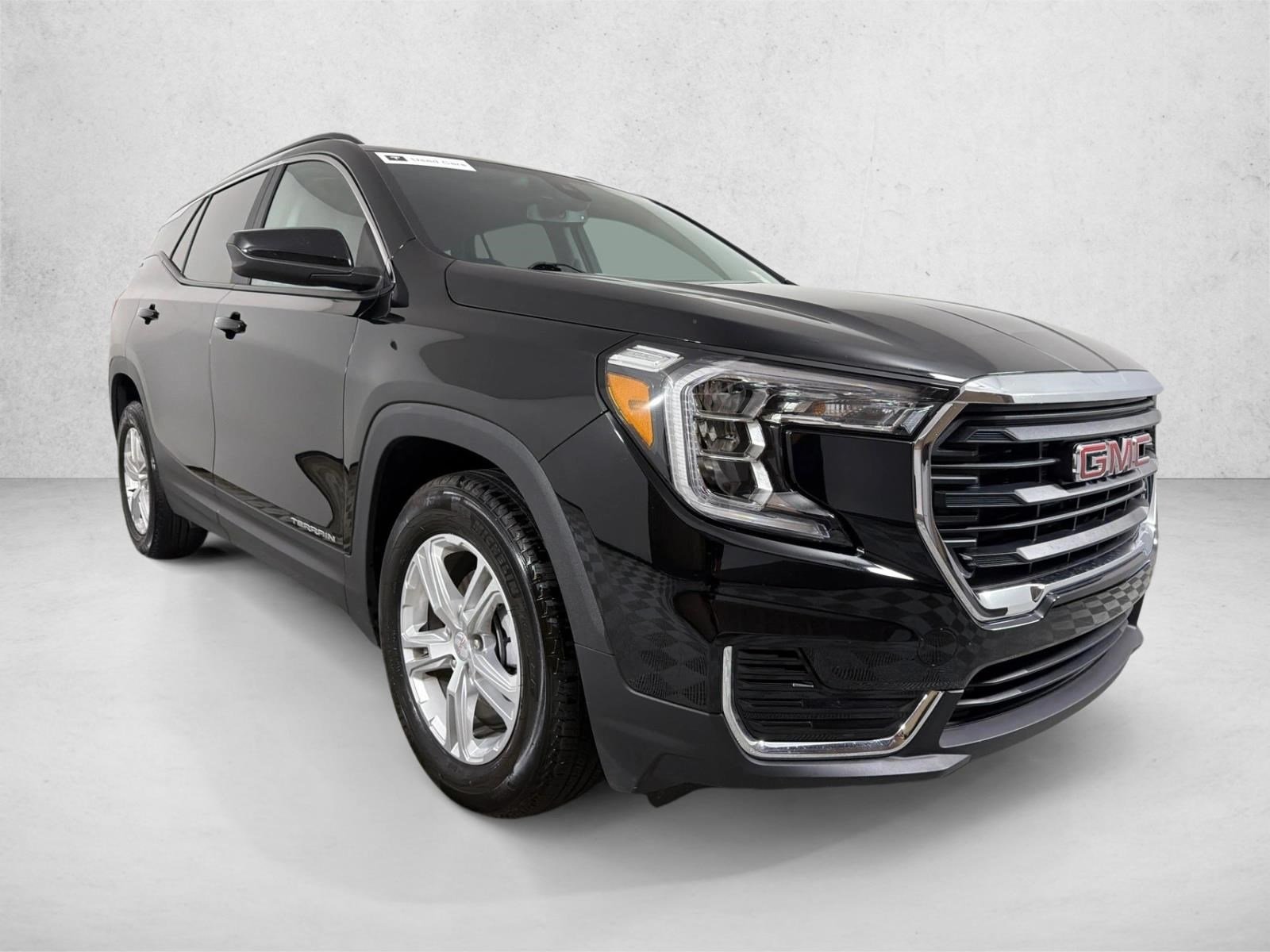 Used 2022 Ebony Twilight Metallic GMC SLE image 1