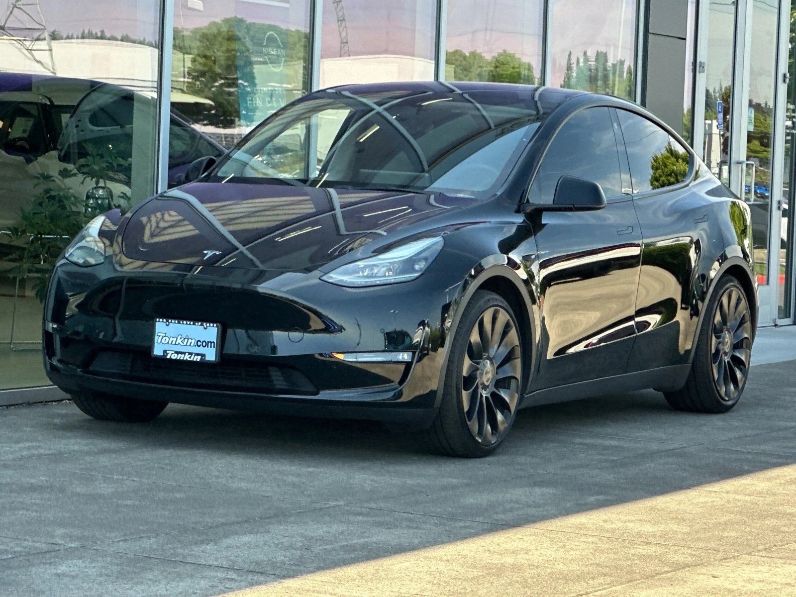 Used 2022 Solid Black Tesla Performance image 7