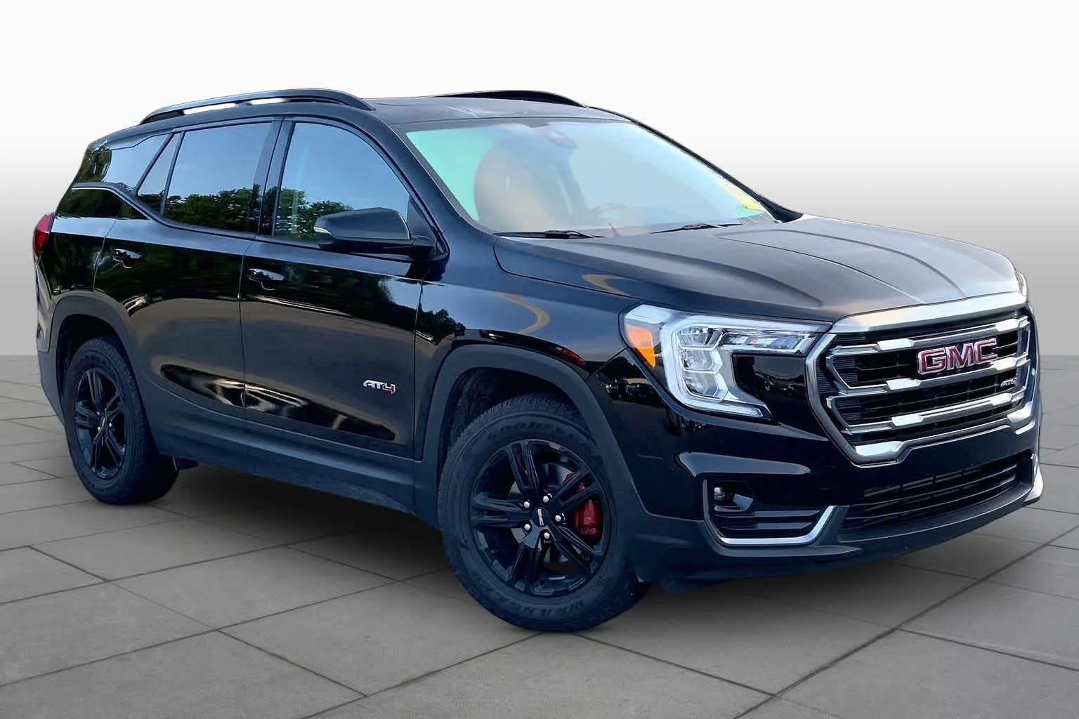 Used 2023 Ebony Twilight Metallic GMC AT4 image 3