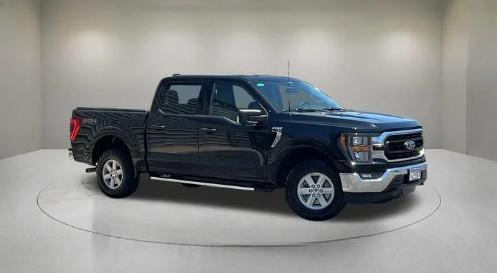 Certified Used 2023 Agate Black Metallic Ford XLT image 1