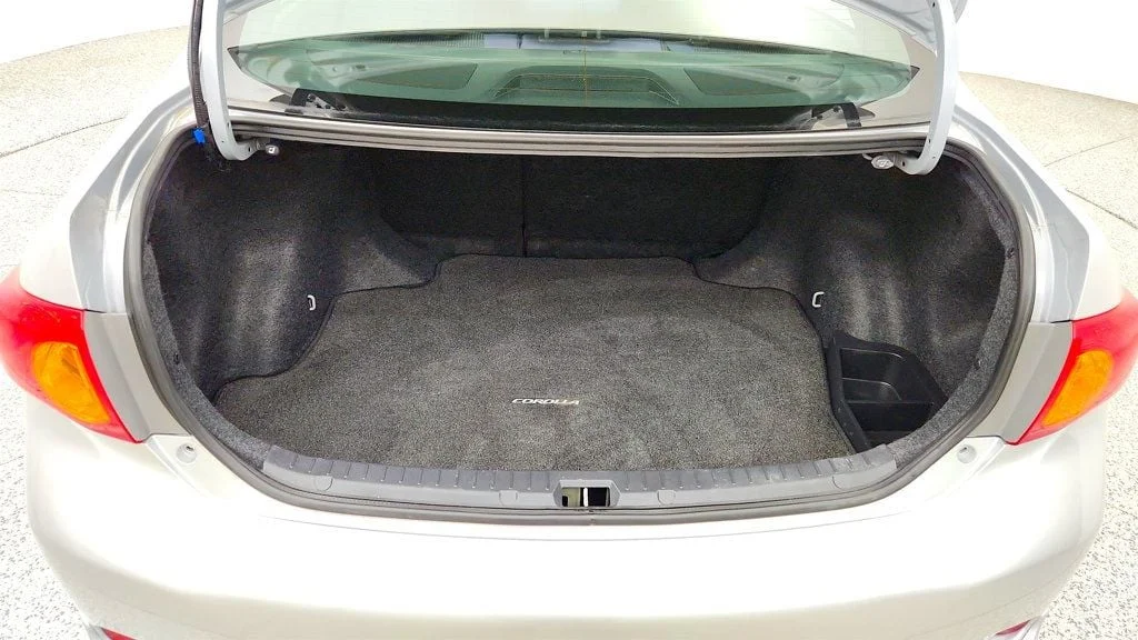 Used 2010 Classic Silver Metallic Toyota 4dr Sedan Manual S w/ Power Moonroof & 16