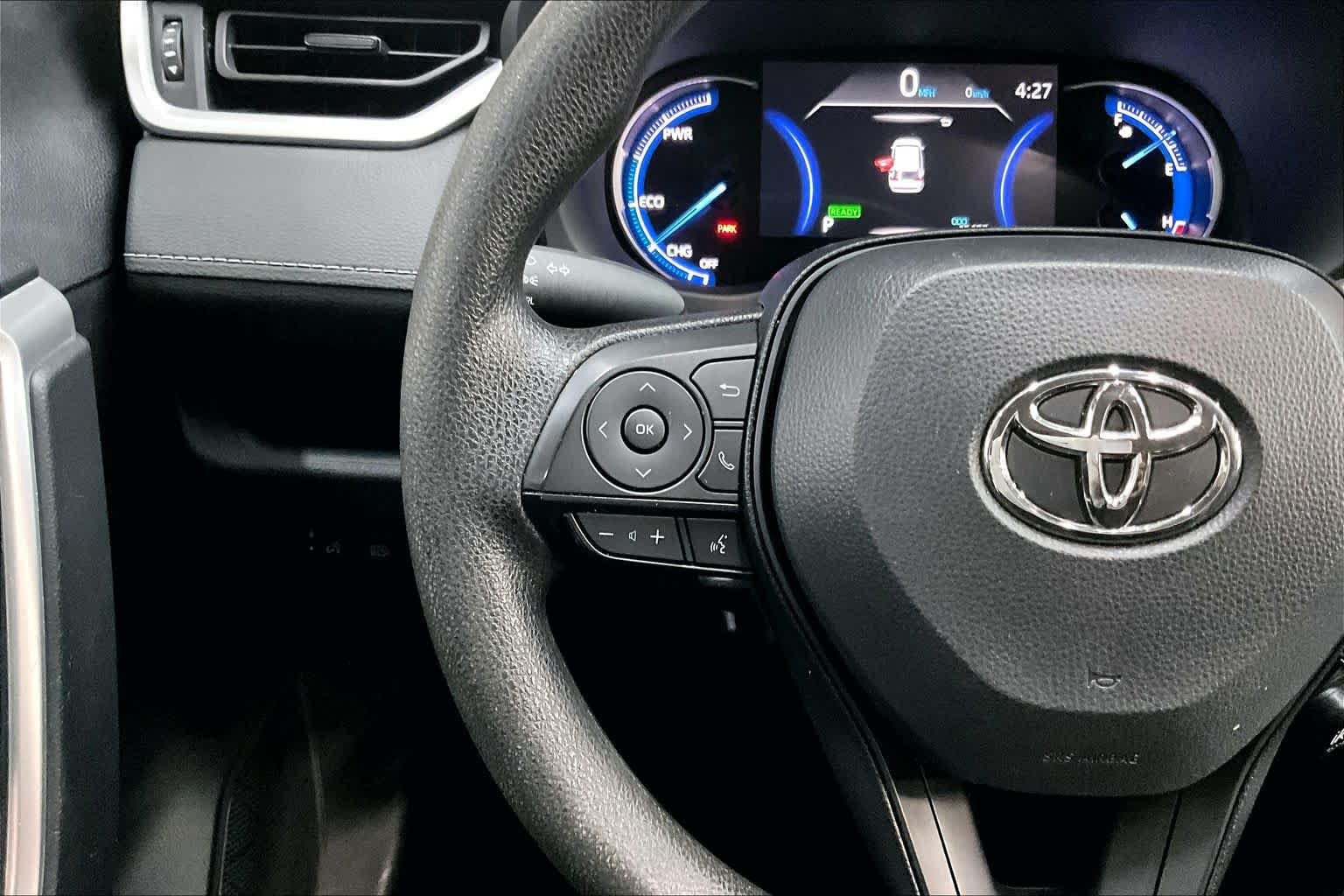 Used 2025 Midnight Black Metallic Toyota Hybrid LE image 24