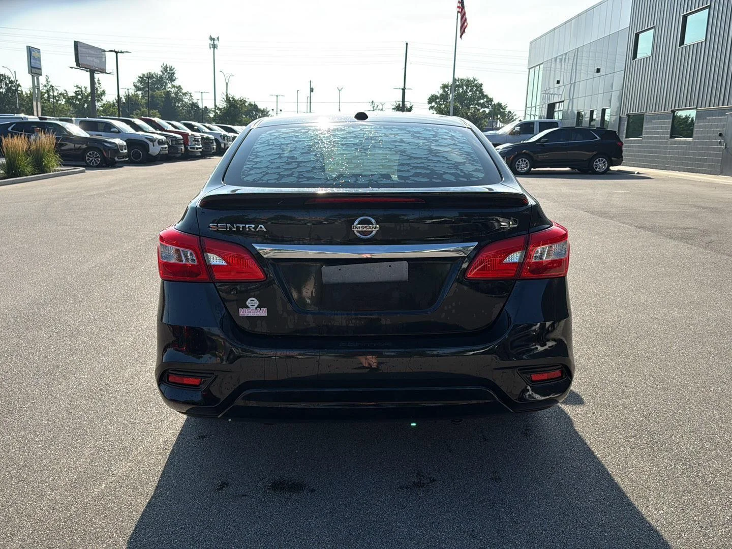 Used 2018 Super Black Nissan SL image 4