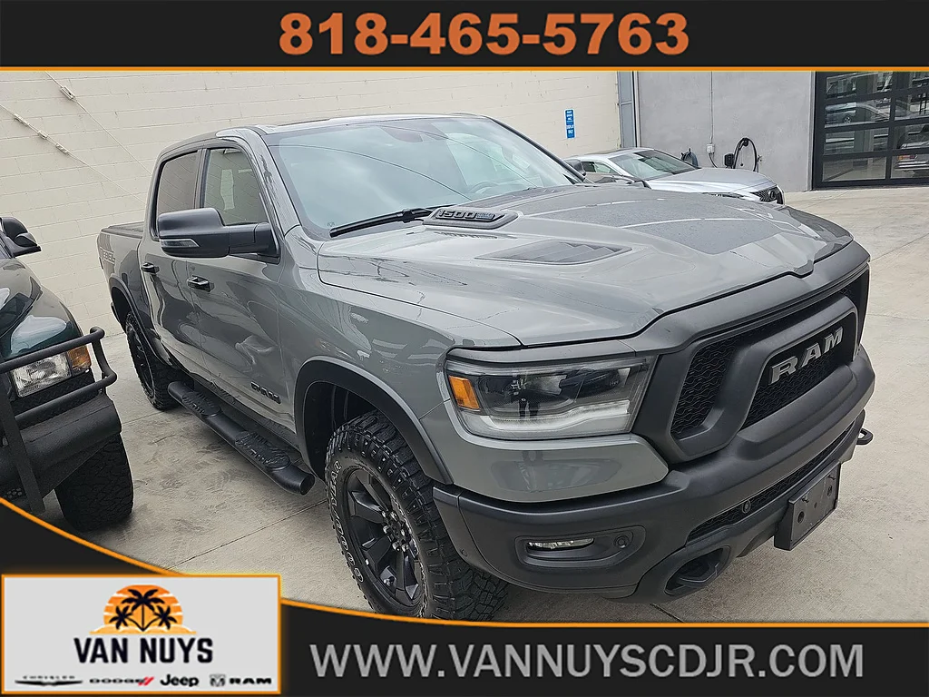 Used 2023 Ceramic Gray Clear Coat Ram Rebel image 1
