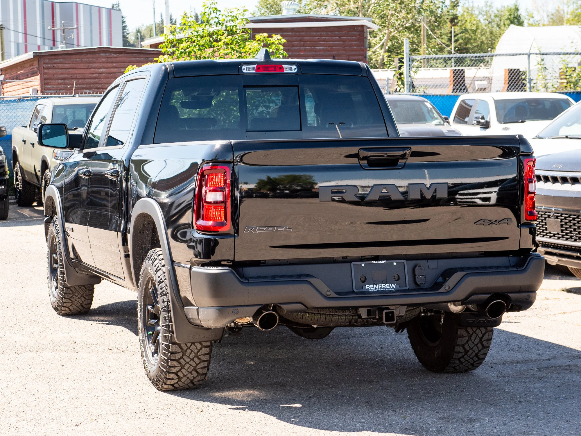 New 2026 Black RAM Rebel* Crew Cab 4x4, 33 Inch A/T Tires, Pano Sunroof, Passenger Screen image 5