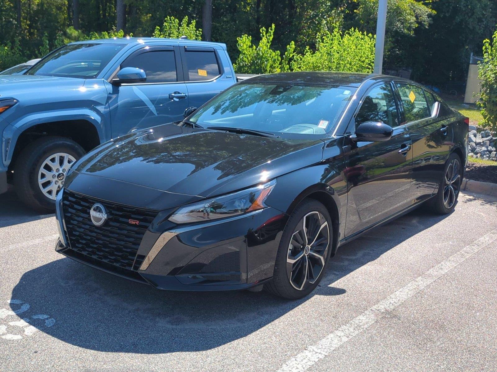 Used 2025 Super Black Nissan SR image 1