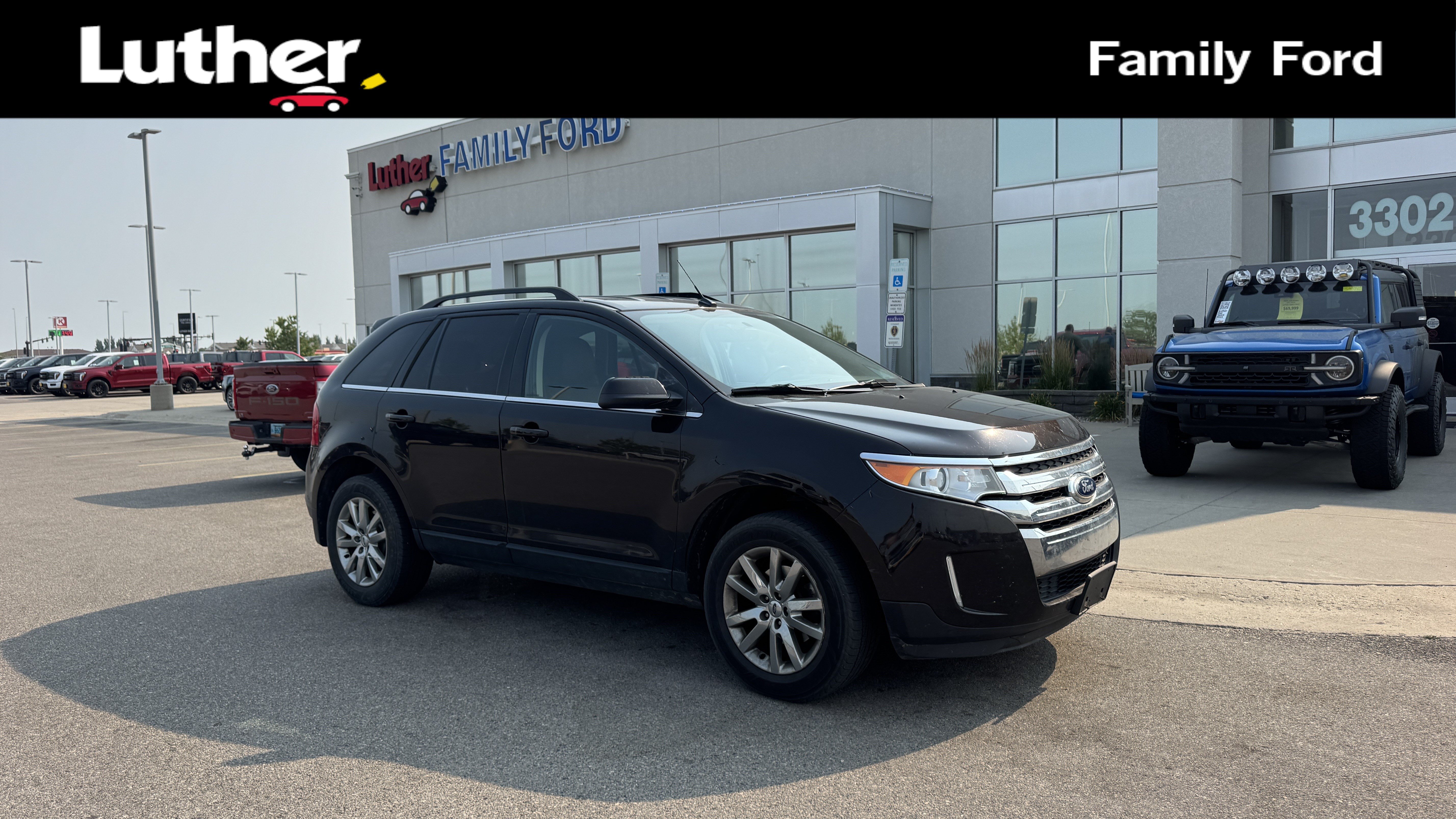 Used 2014 Kodiak Brown Metallic Ford Limited image 1
