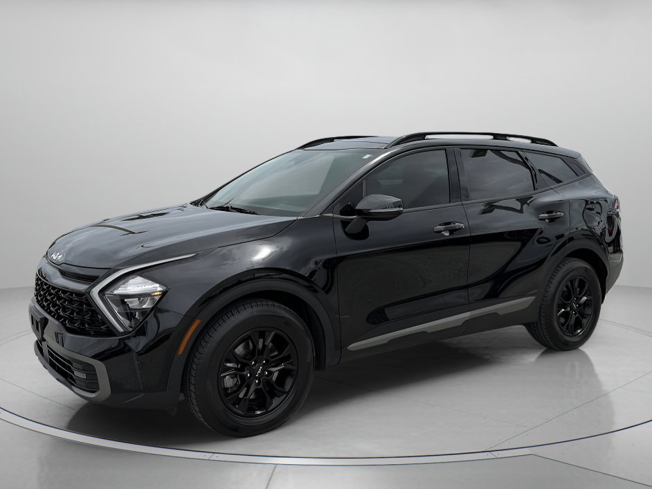 Used 2023 Ebony Black Kia X-Pro image 1