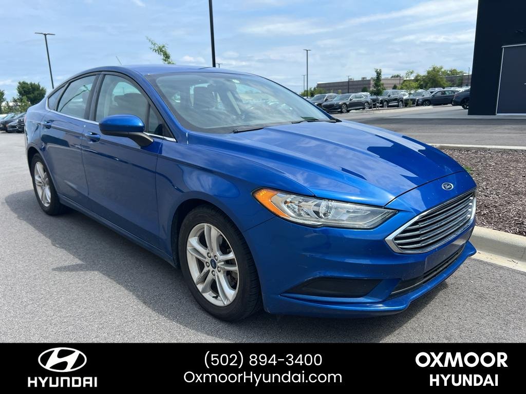 Used 2018 Lightning Blue Ford SE image 1