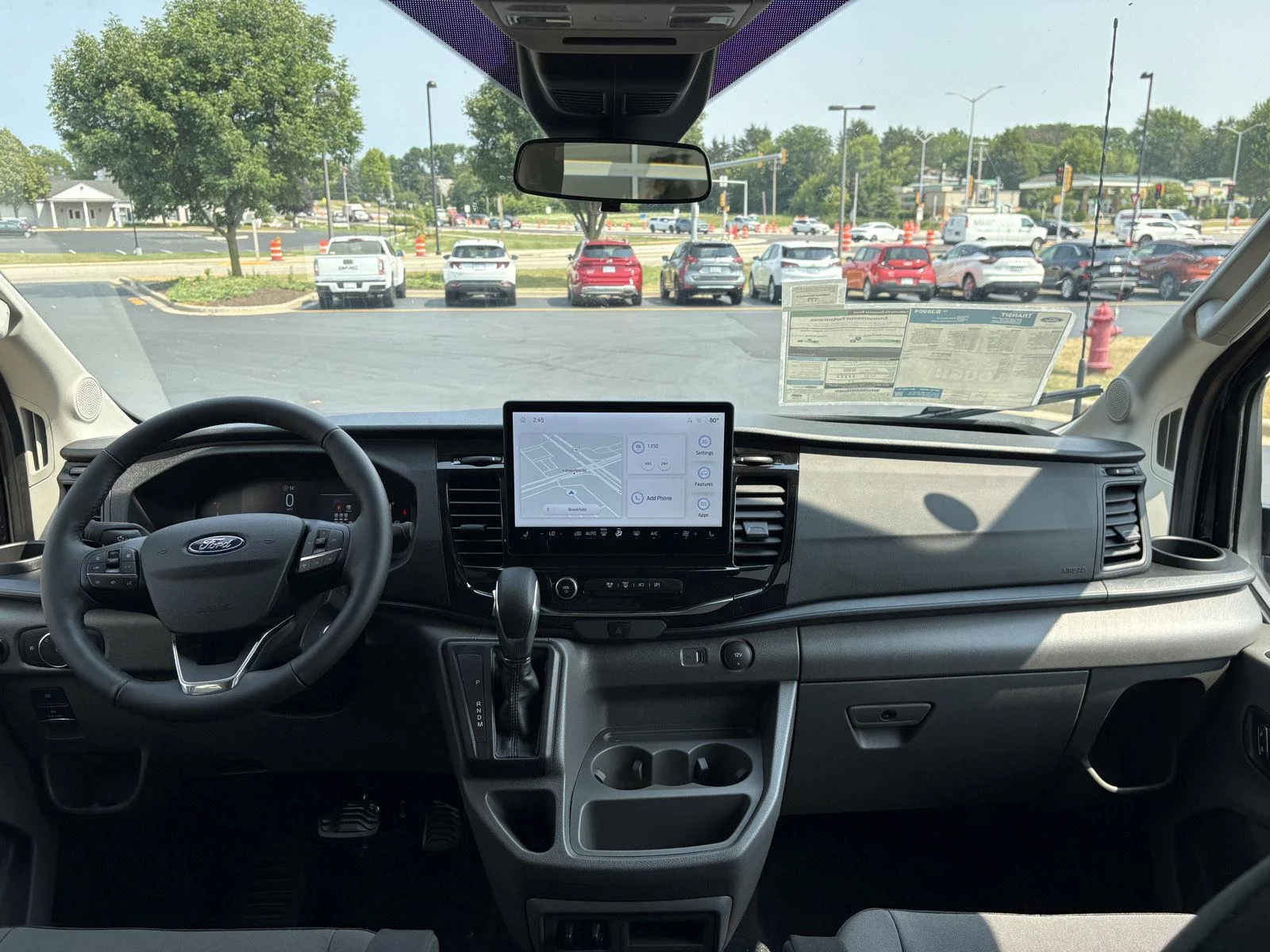 New 2026 Agate Black Metallic Ford Passenger Van XLT image 8