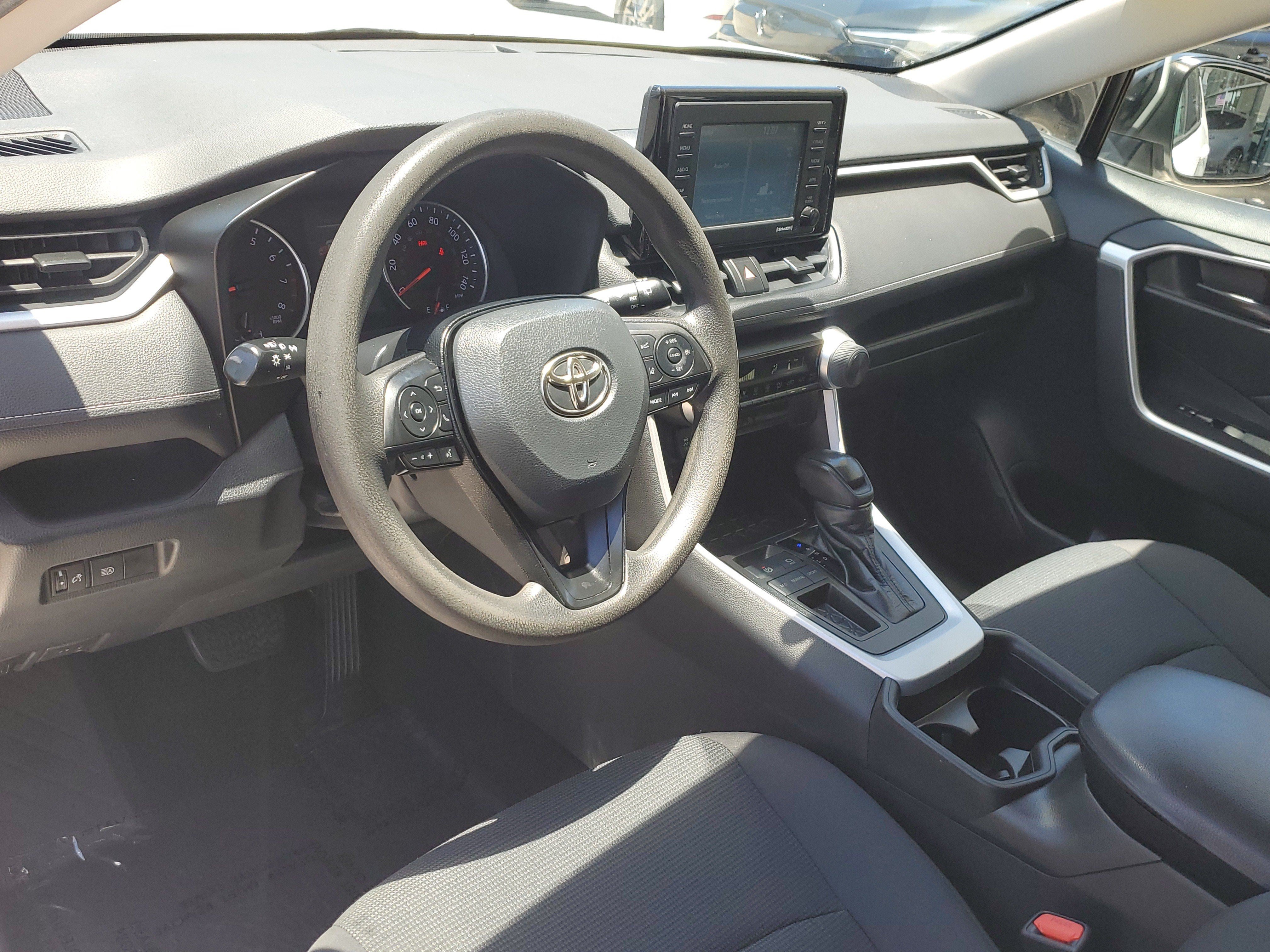 Used 2021 Super White Toyota LE image 18