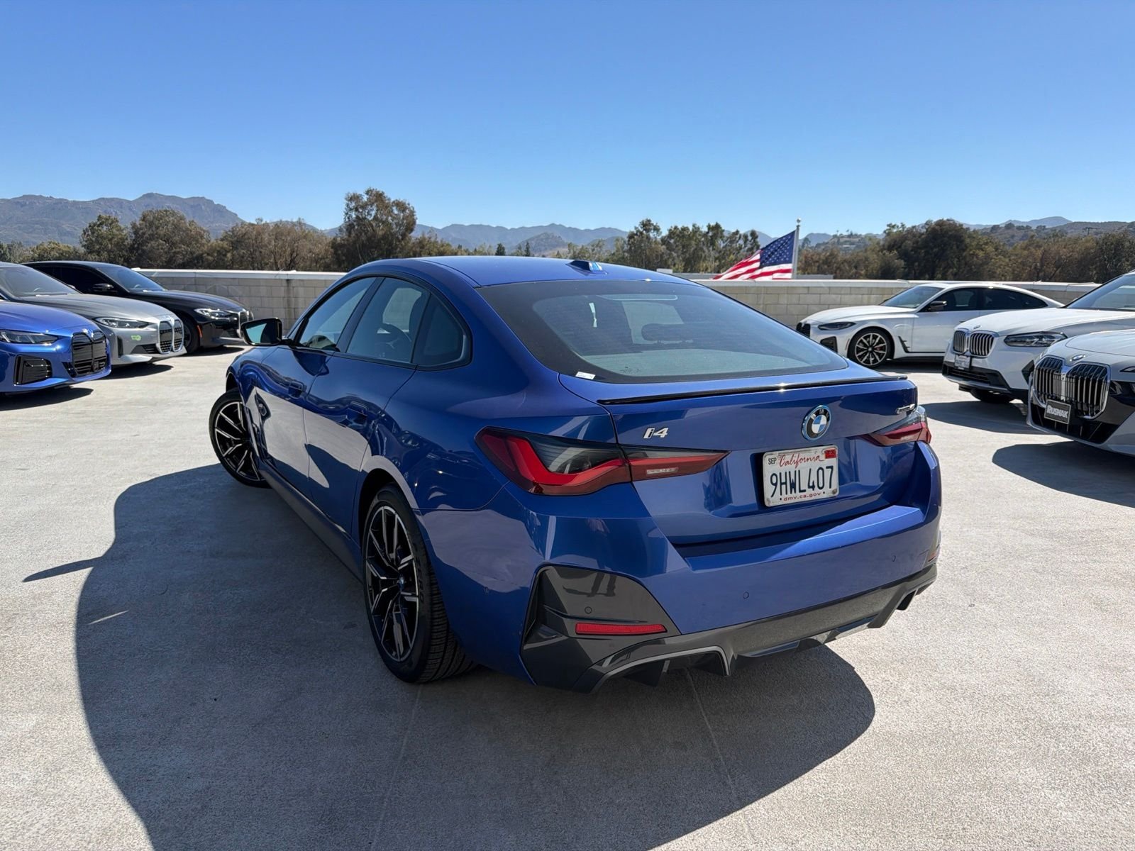 Certified Used 2023 Portimao Blue Metallic BMW eDrive40 image 2