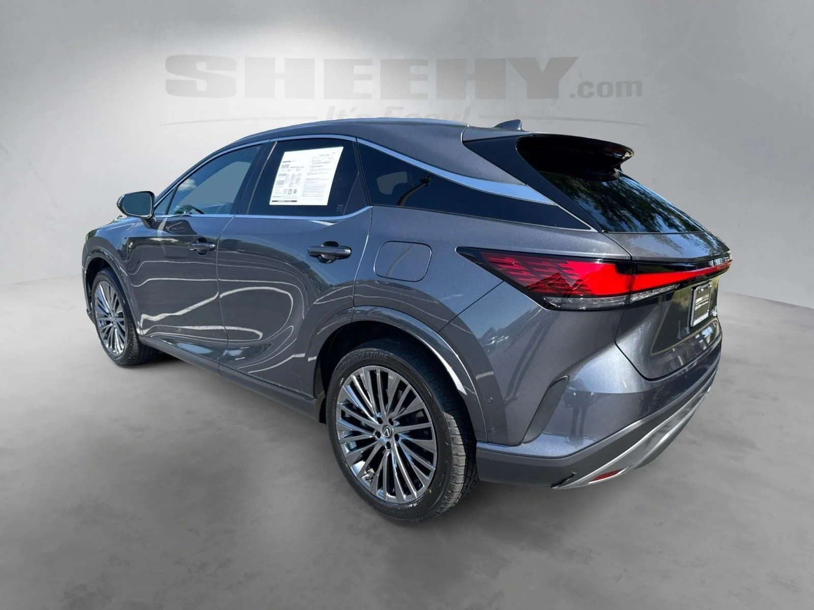 Used 2025 Gray Lexus 450h+ Luxury image 13