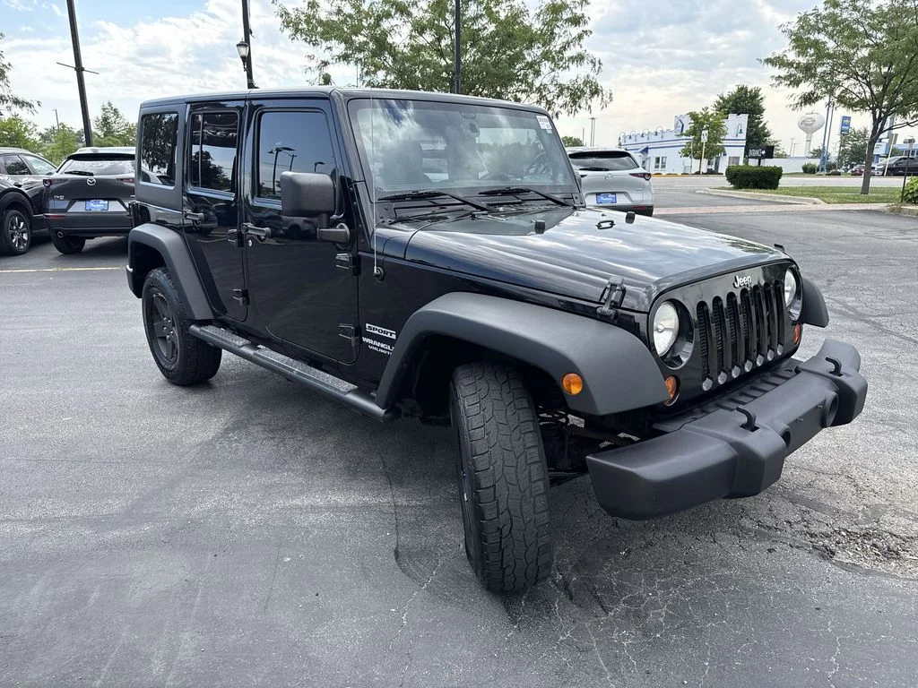 Used 2013 Black Jeep Unlimited Sport image 5