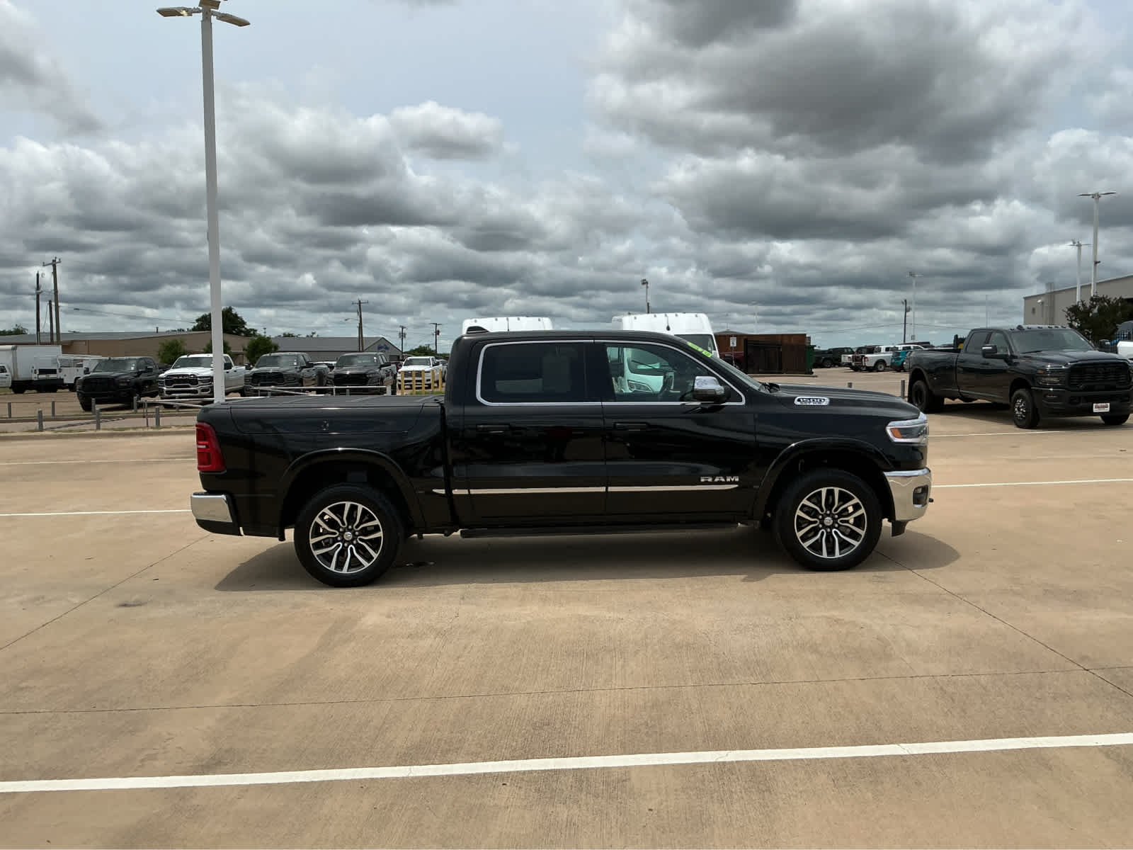 Used 2025 Diamond Black Crystal Pearlcoat Ram Limited image 5