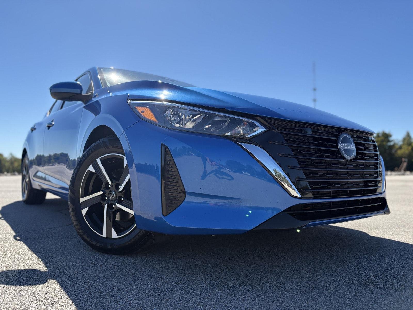 Used 2025 Electric Blue Metallic Nissan SV image 16