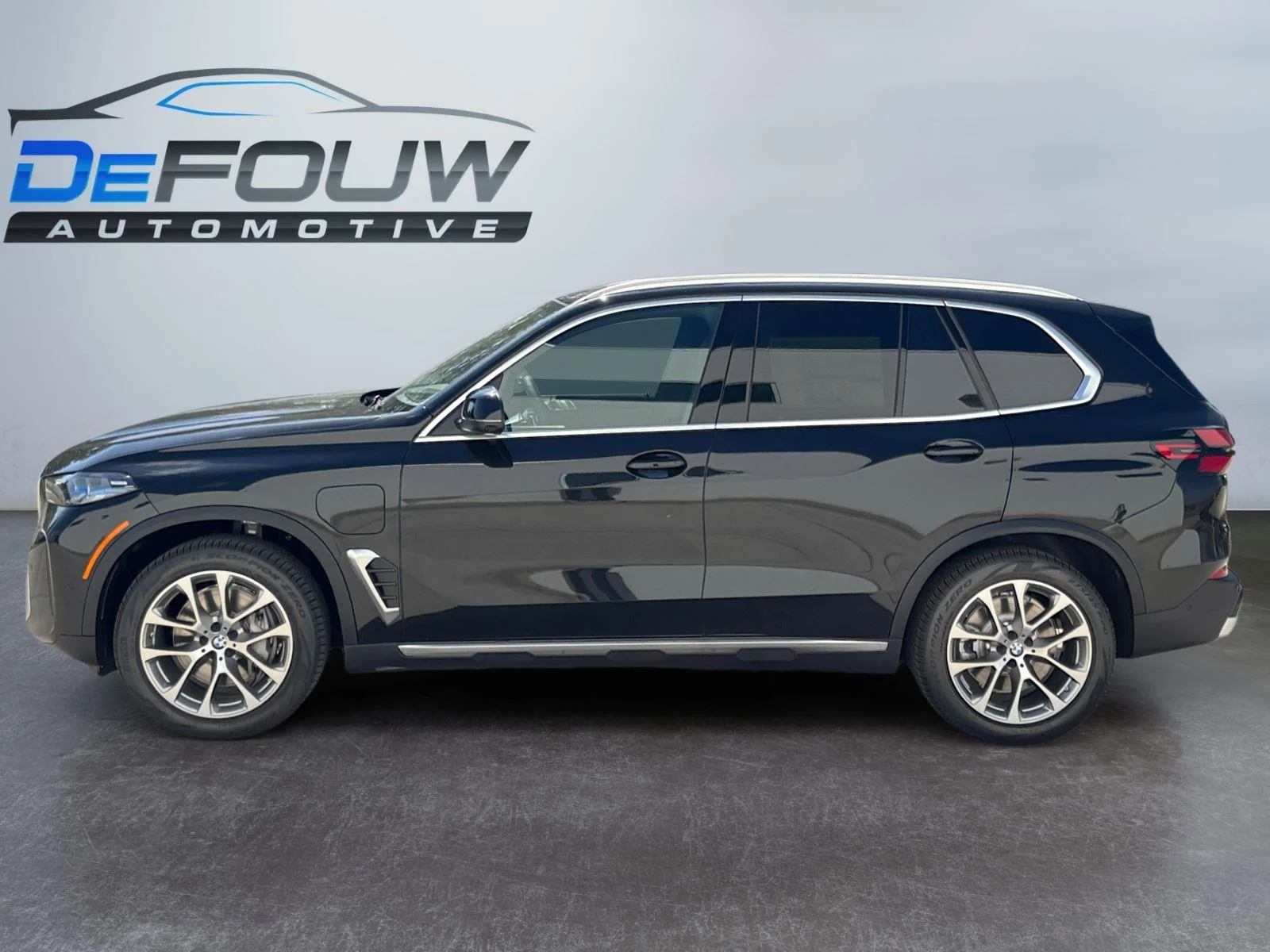 New 2026 Black Sapphire Metallic BMW xDrive50e image 6