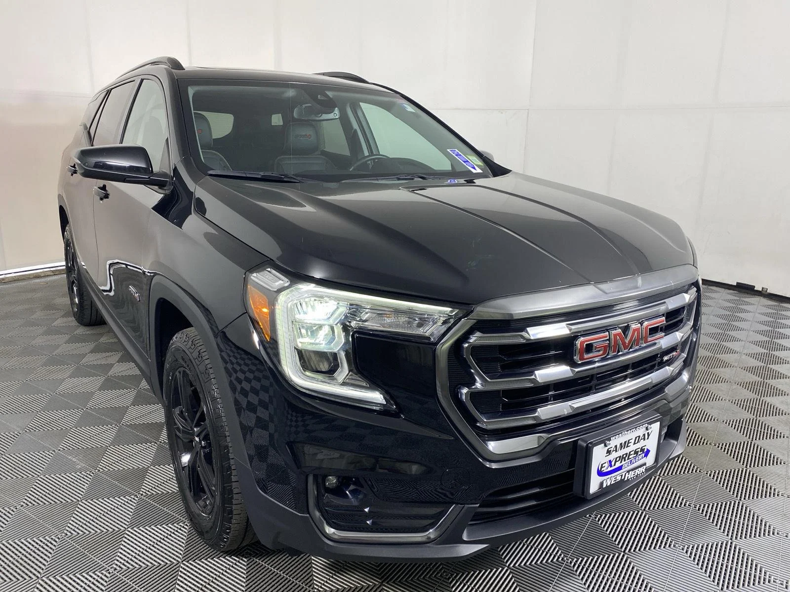 Used 2024 Ebony Twilight Metallic GMC AT4 image 18