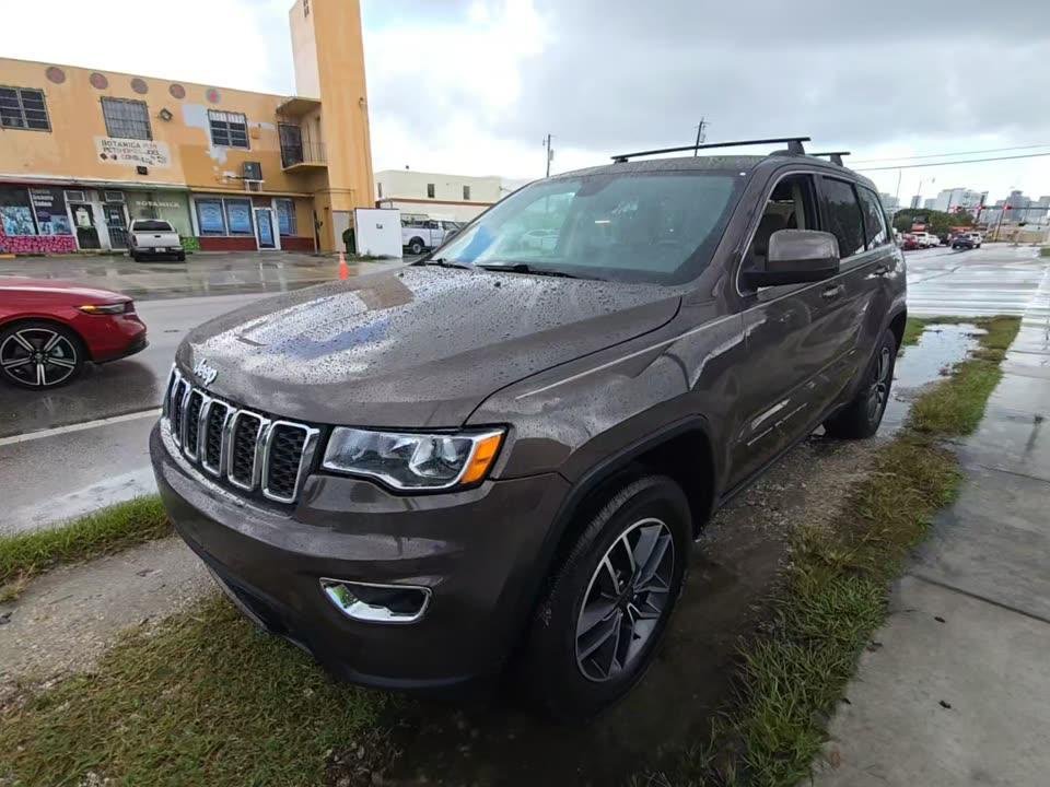 Used 2019 Walnut Brown Metallic Clearcoat Jeep Laredo E 4x4 image 1