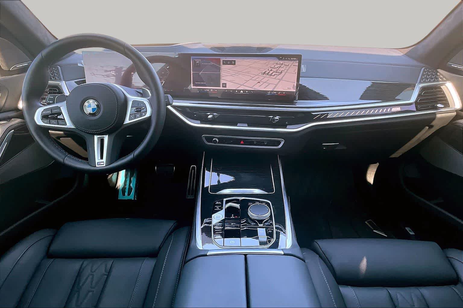 Used 2025 Mineral White Metallic BMW M60i image 13