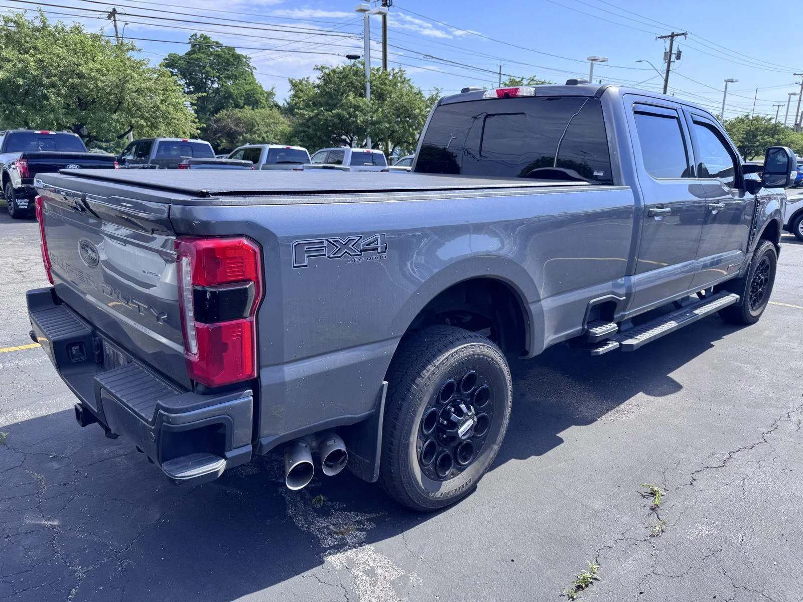 Used 2024 Carbonized Gray Ford LARIAT image 4