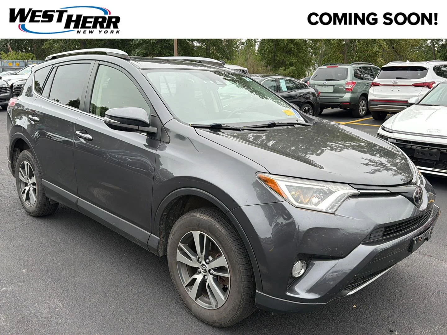 Used 2018 Magnetic Gray Metallic Toyota XLE image 1