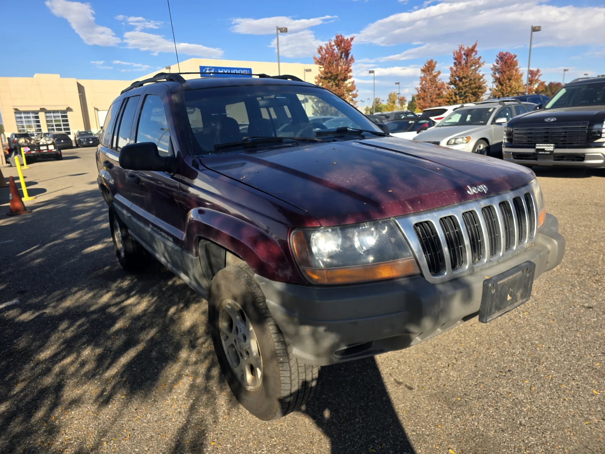 Used 2000 Flame Red Clearcoat Jeep Laredo image 7