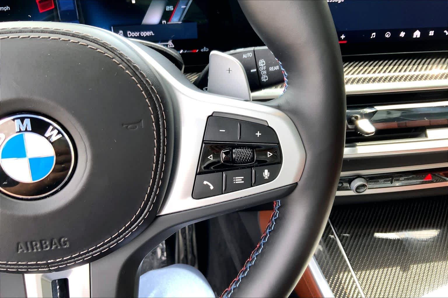 Used 2025 Black Sapphire Metallic BMW M60i image 24