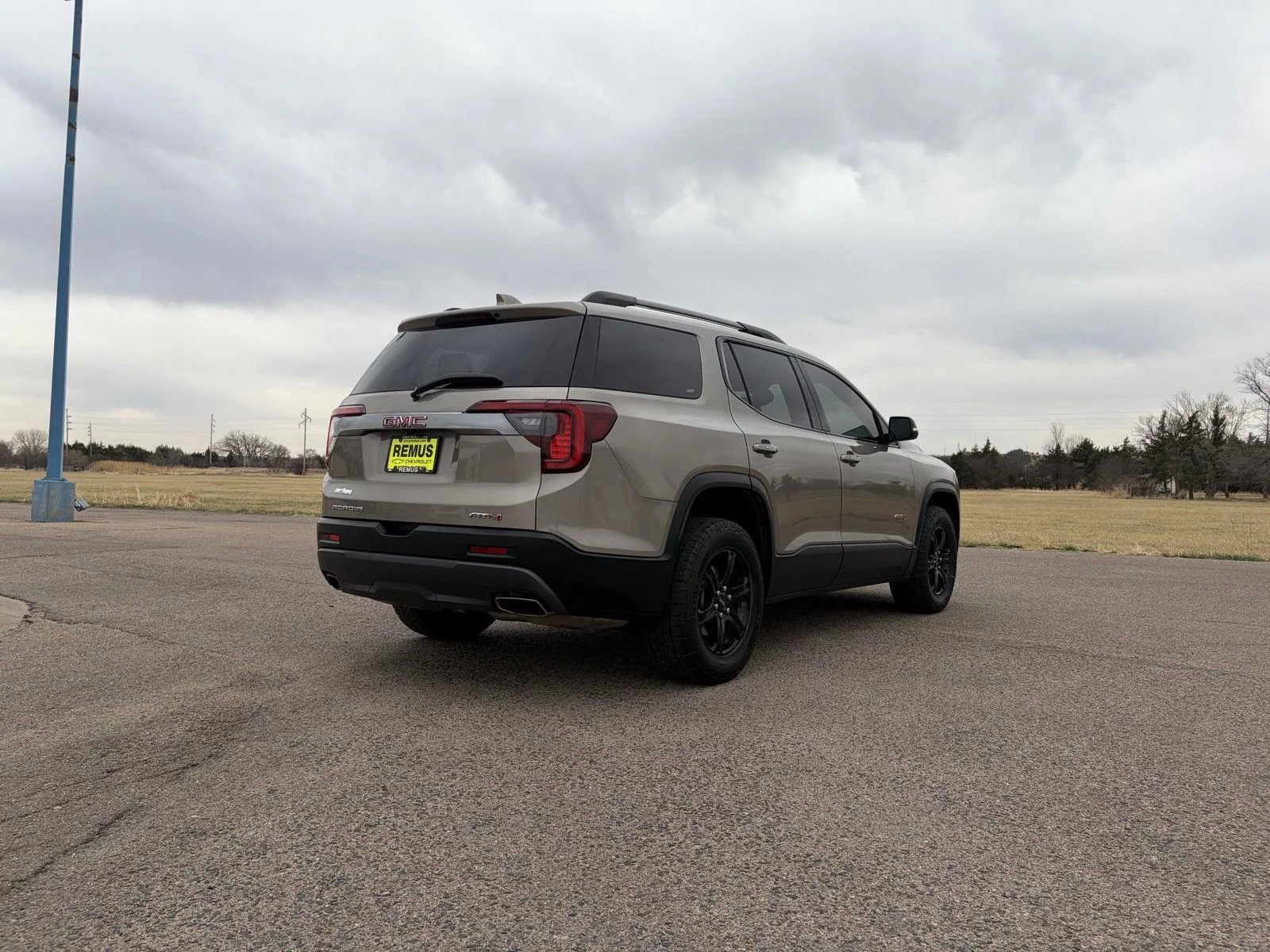 Used 2023 Light Stone Metallic GMC AT4 image 7