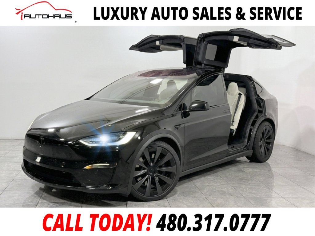 Used 2025 Black Tesla Base image 1