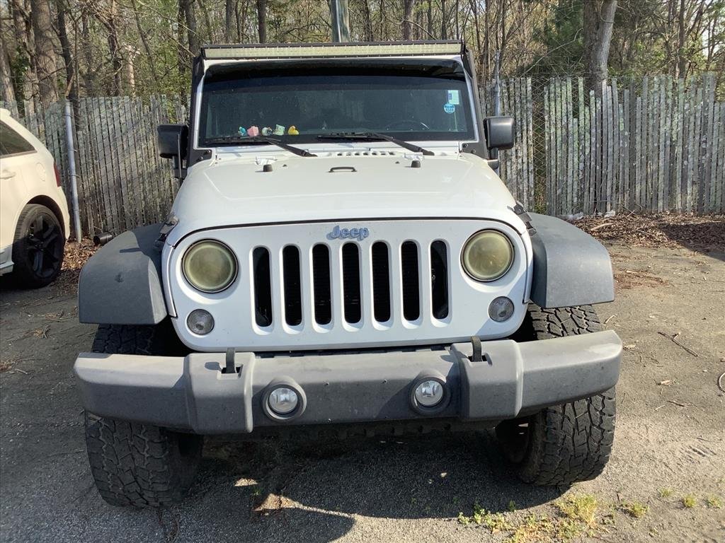Used 2016 Jeep Wrangler Unlimited Sport S with VIN 1C4BJWDGXGL120266 for sale in Lexington, NC