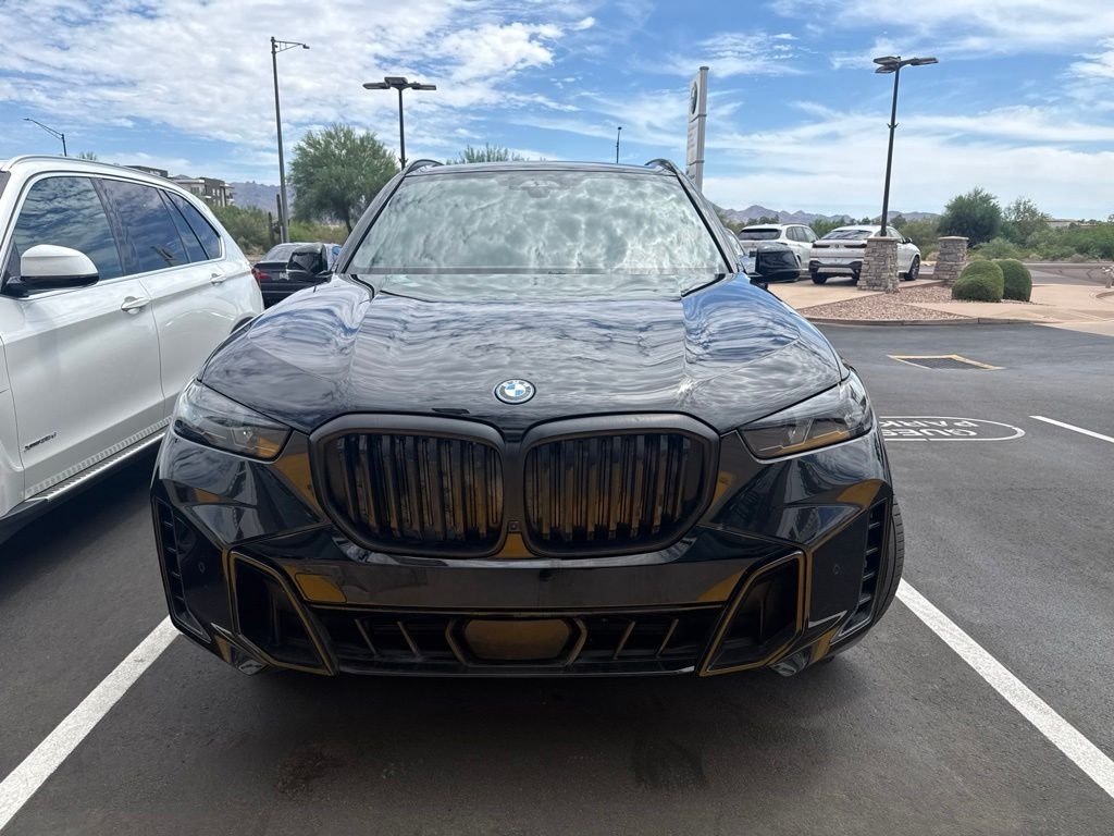 Certified Used 2024 Black Sapphire Metallic BMW xDrive50e image 2