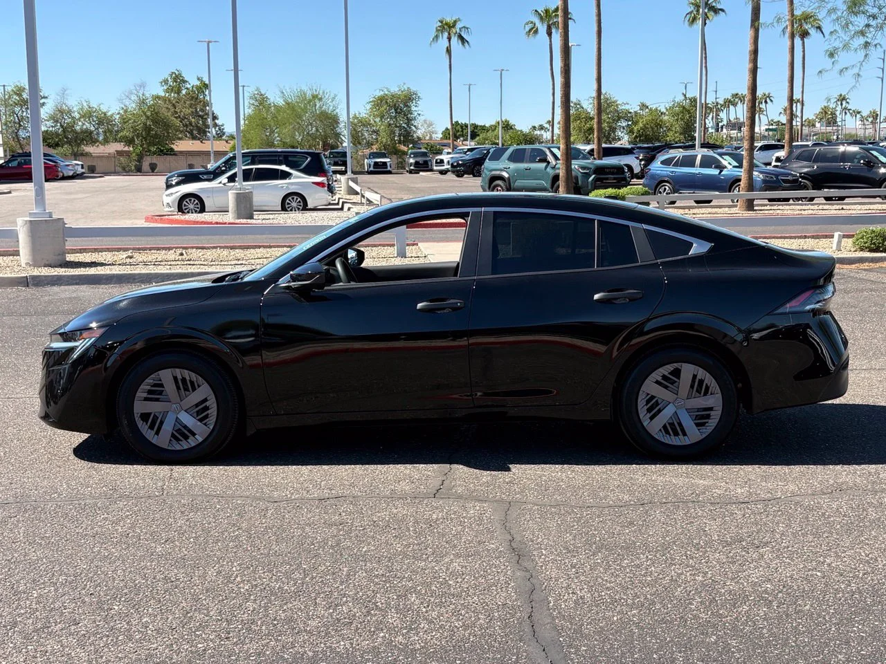 Used 2026 Super Black Nissan S image 2