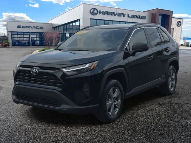 Used 2025 Midnight Black Metallic Toyota LE image 1