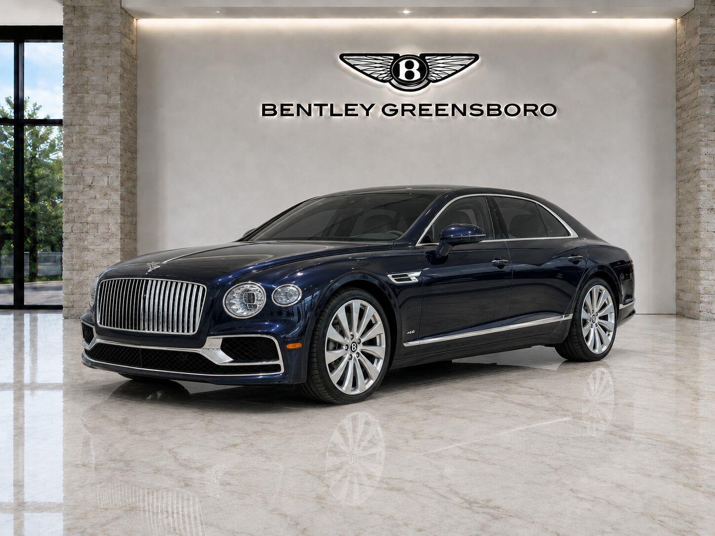 Used 2023 Dark Sapphire Bentley Hybrid AWD image 1