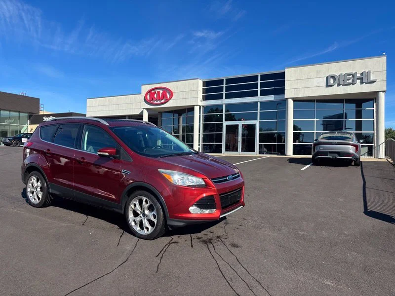 Used 2016 Orange Ford Titanium image 4