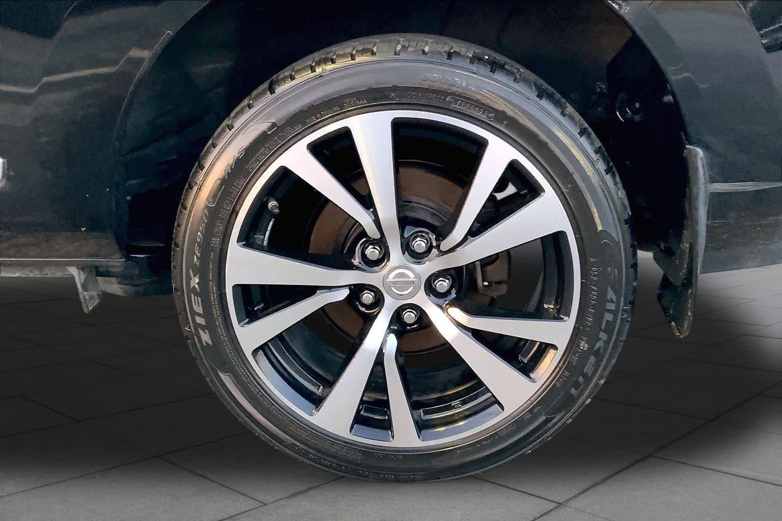 Used 2015 Super Black Nissan S image 9
