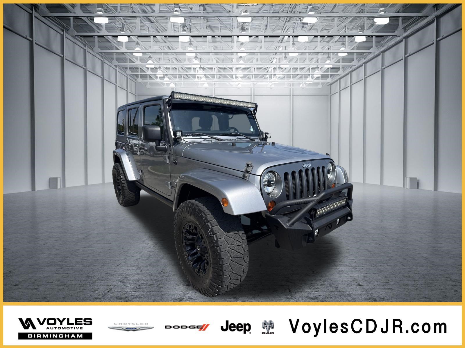 Used 2013 Billet Silver Metallic Jeep Freedom Edition image 1