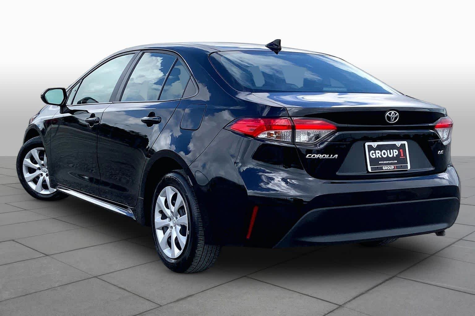Used 2024 Midnight Black Metallic Toyota LE image 12