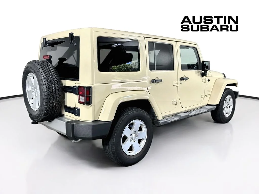 Used 2012 Beige Jeep Unlimited Sahara image 7